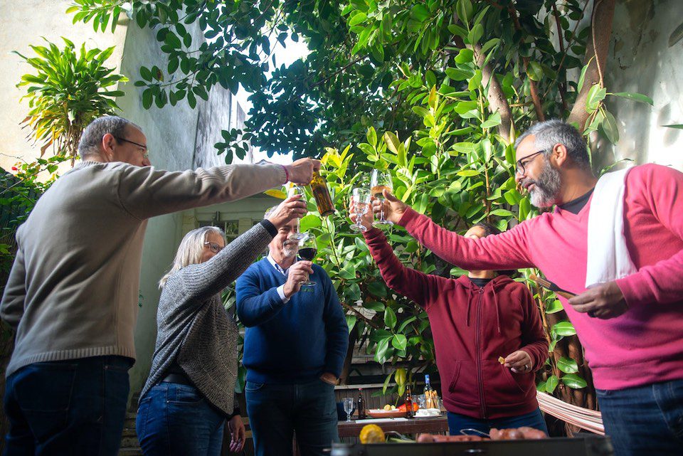 friends toasting in backyard