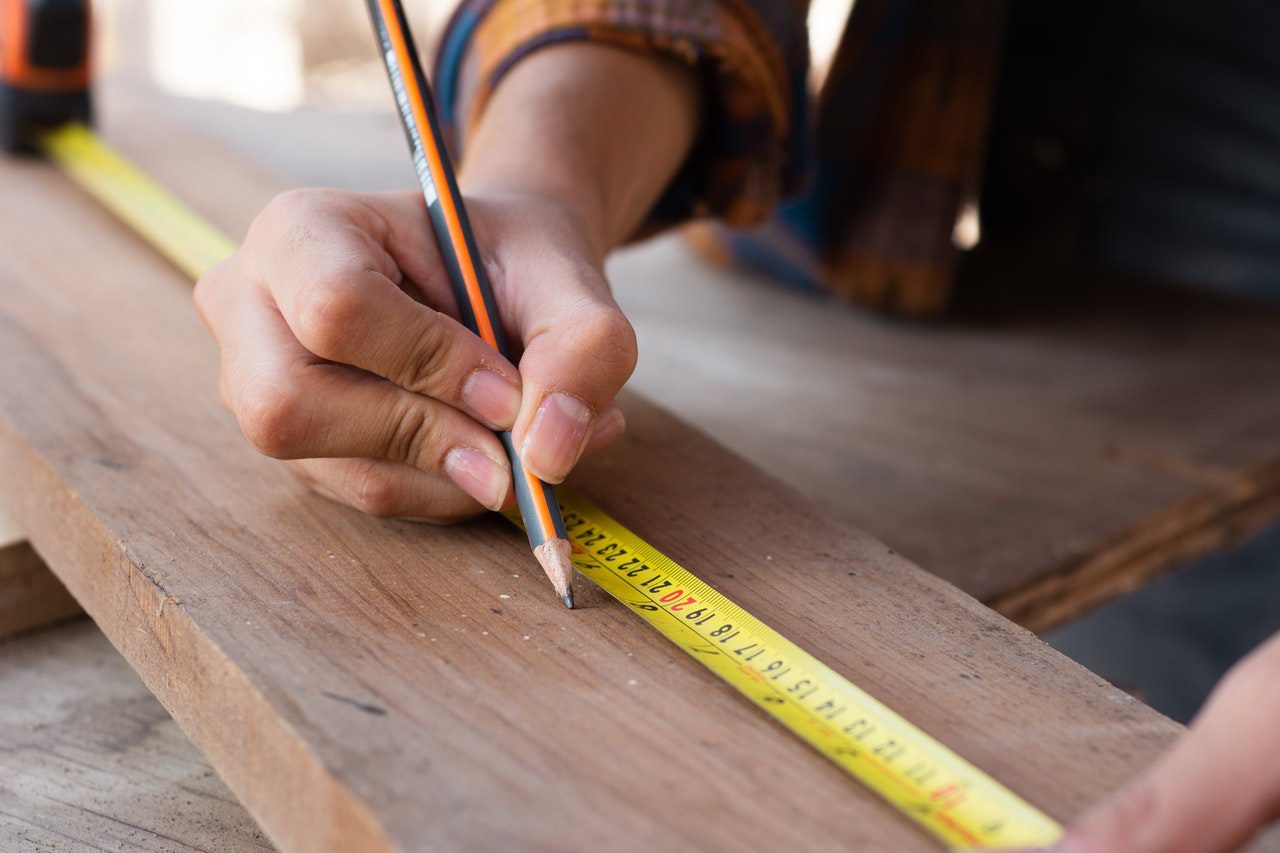 using tape measure while doing DIY project