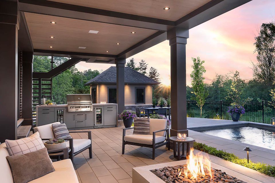 outdoor kitchen and living space with cover