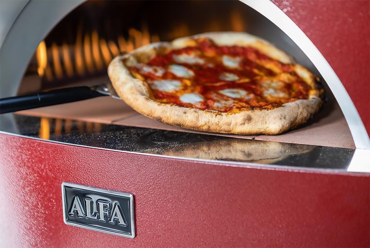red Alfa pizza oven cooking pizza