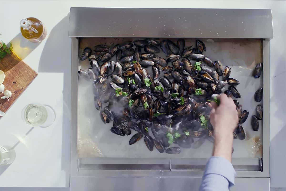 Mussels on Asado Cooktop