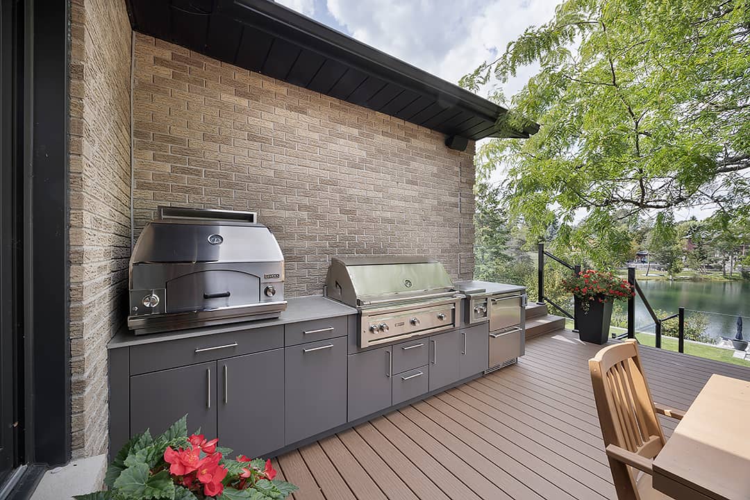 galley outdoor kitchen with Lynx pizza oven and grill
