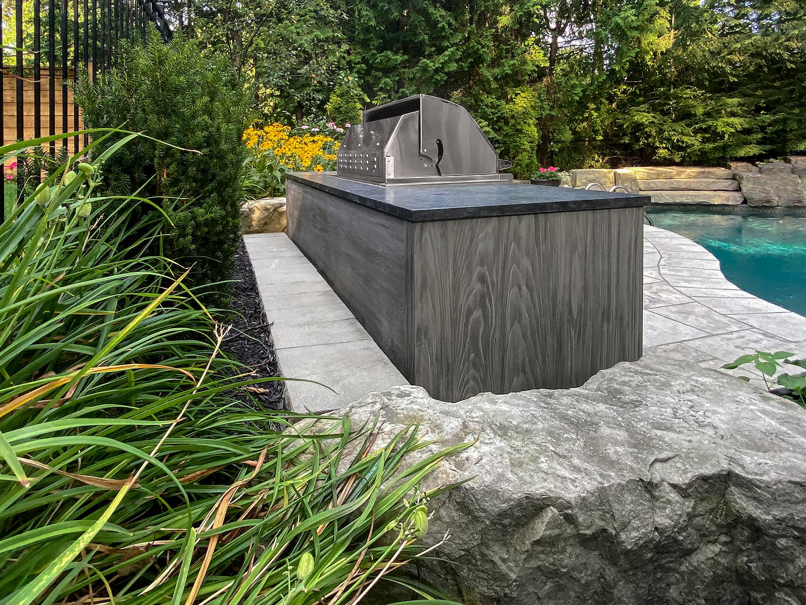 NatureKast cabinetry, Sedona grill, bar fridge