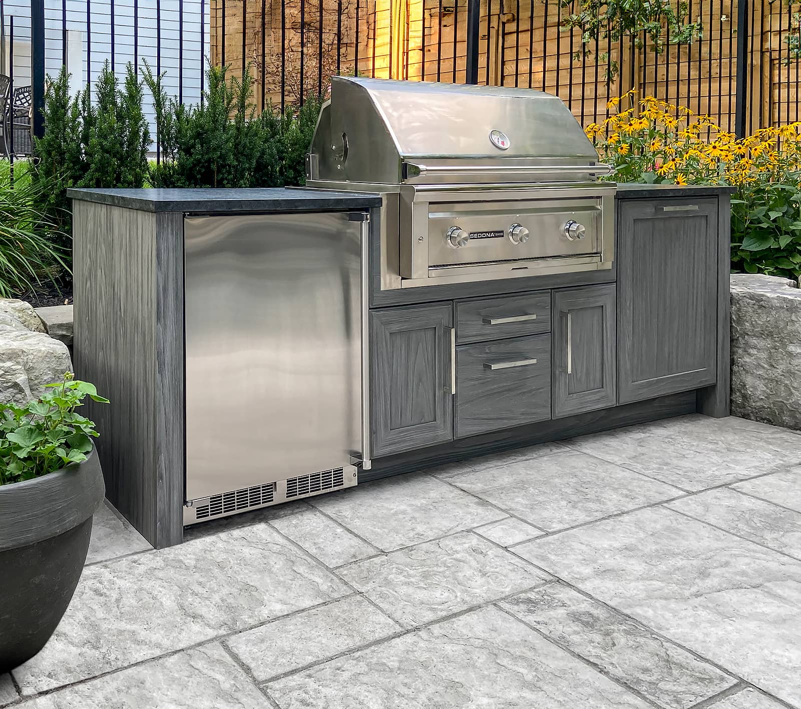 NatureKast cabinetry, Sedona grill, bar fridge