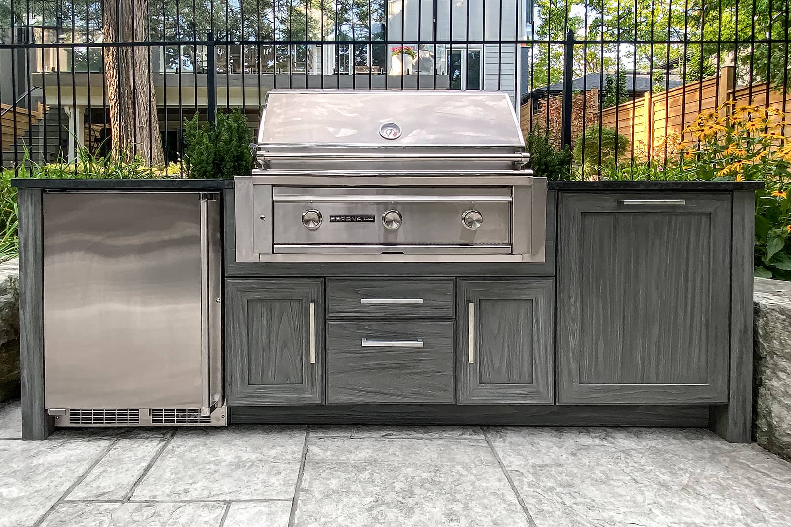 NatureKast cabinetry, Sedona grill, bar fridge