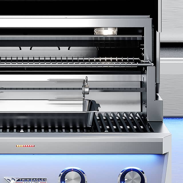 man grilling steak on grill